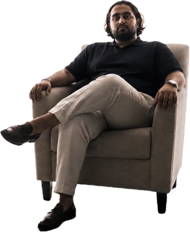 Danial Shiekho, seated, relaxed