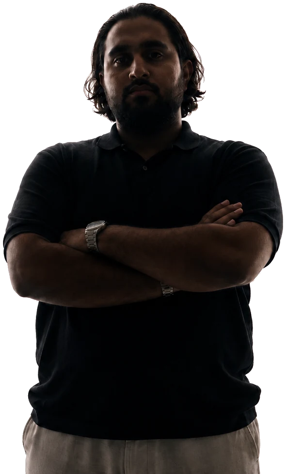 Danial Shiekho, arms crossed, steady