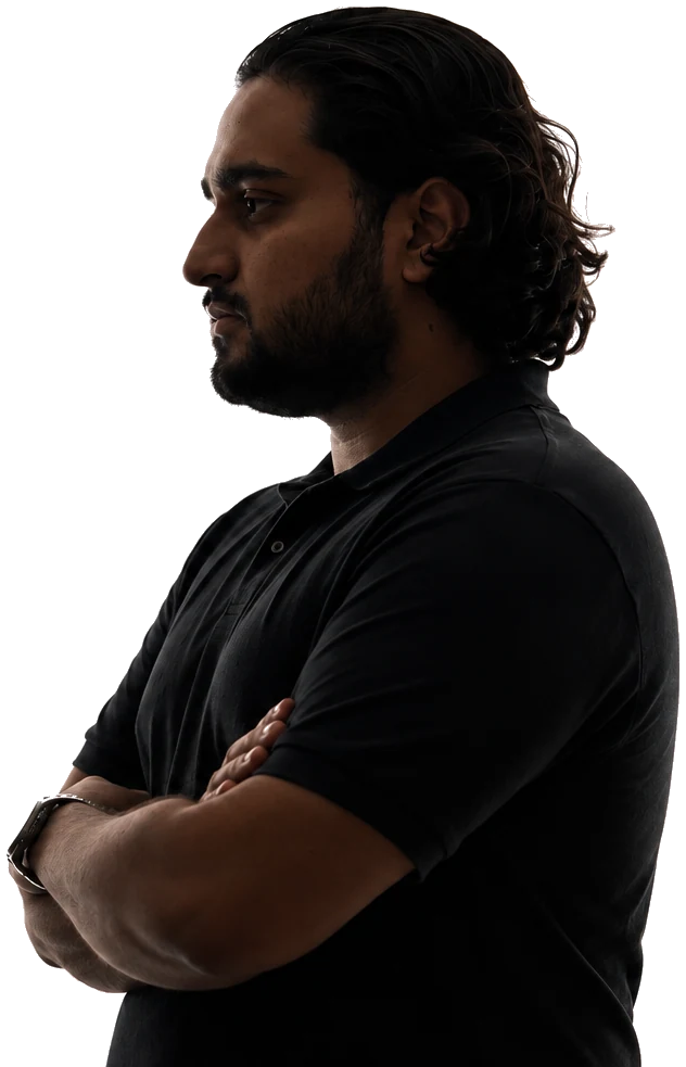 Danial Shiekho, arms crossed, profile